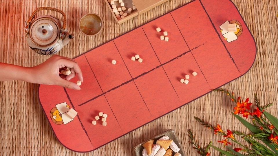 Chuẩn bị và thiết lập bàn chơi ô ăn quan